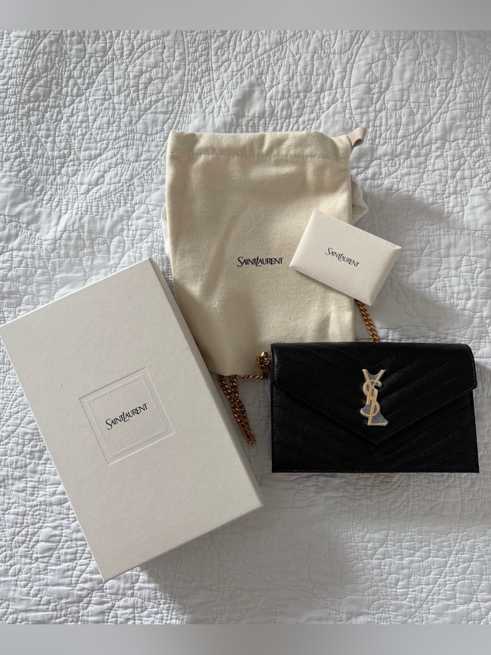 Saint Laurent Cassandre matelassé textured-leather chain wallet in BLACK